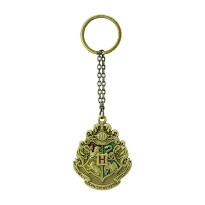 Breloc Harry Potter cu design magic ținut în mână